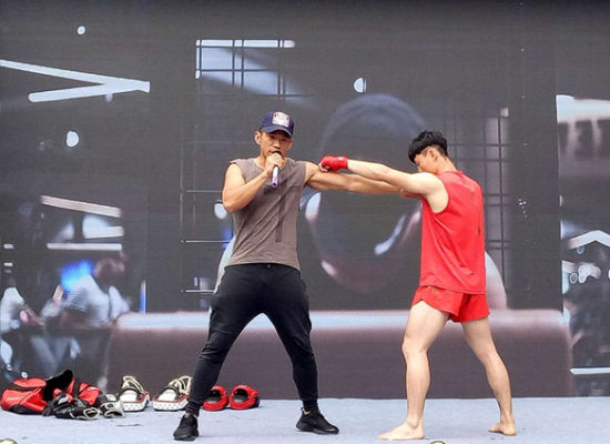 看泰拳 吃美食 泰国运动旅游节在昆举办 - 中新